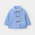 Cappotto teddy con borsetta.