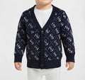 GUESS CARDIGAN BIMBO. POLIESTERE/ACRILICO/LANA.