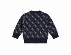 GUESS CARDIGAN BIMBO. POLIESTERE/ACRILICO/LANA.