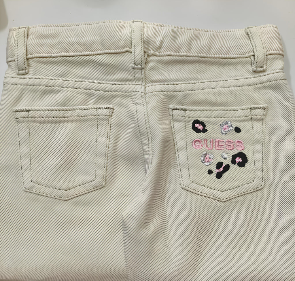 GUESS JEANS A PALAZZO BIMBA. COTONE.
