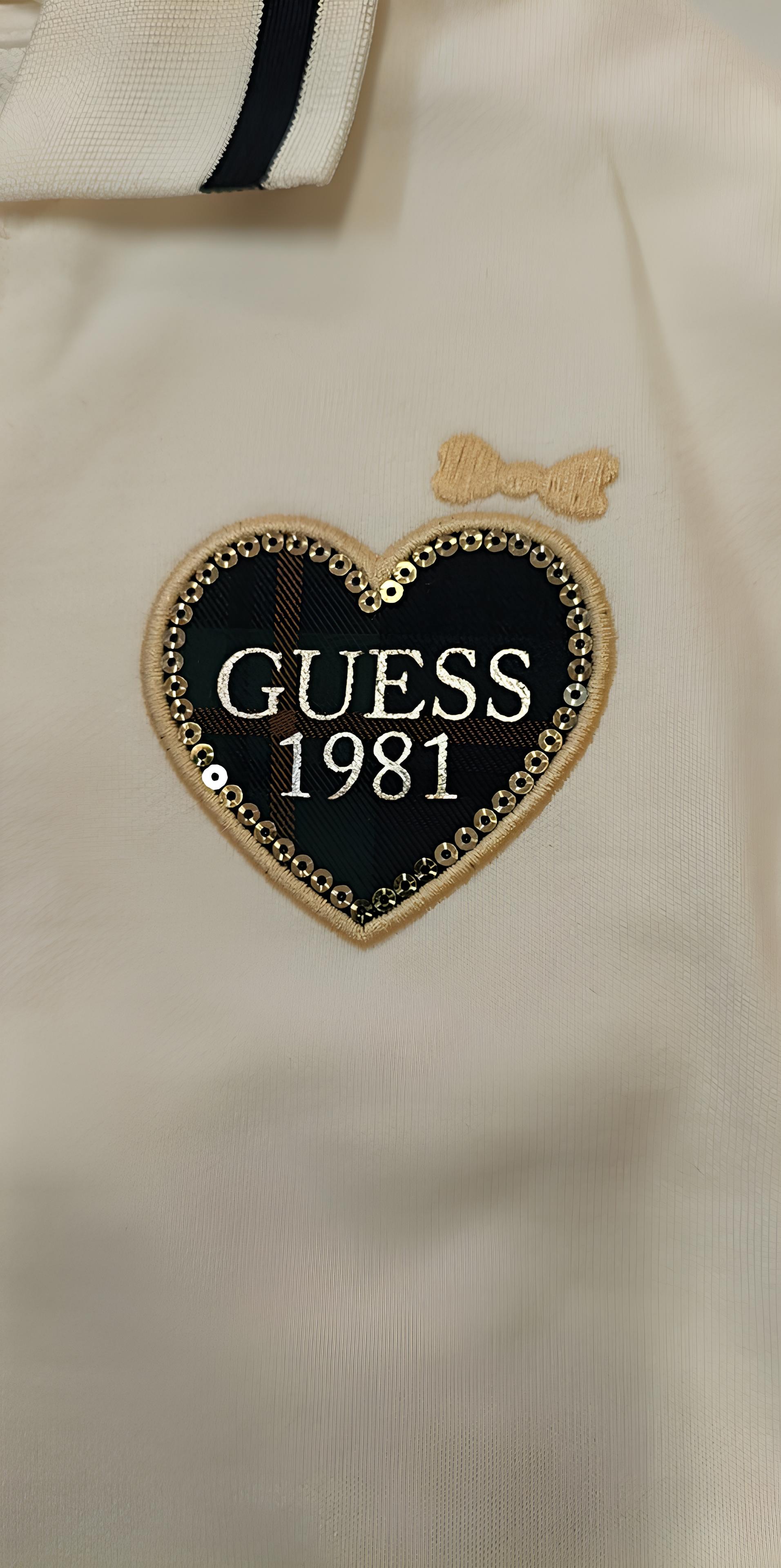 GUESS COMPLETO 2 PZ. BIMBA. COTONE GARZATO.