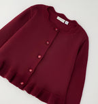 SARABANDA CARIGAN BIMBA . COTONE.